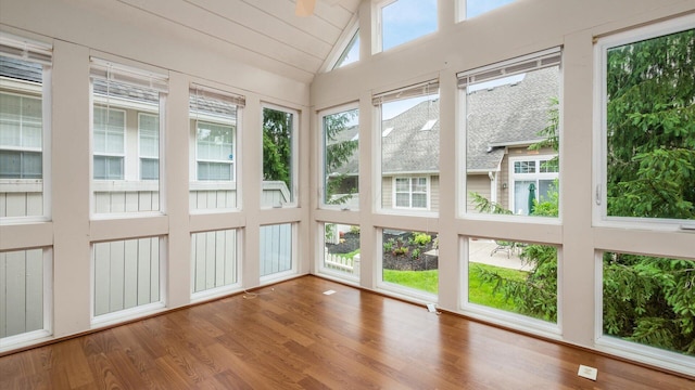 1486 Sedgefield Dr, New Albany, OH 43054 - unfurnished sunroom with high vaulted ceiling and wood finished floors