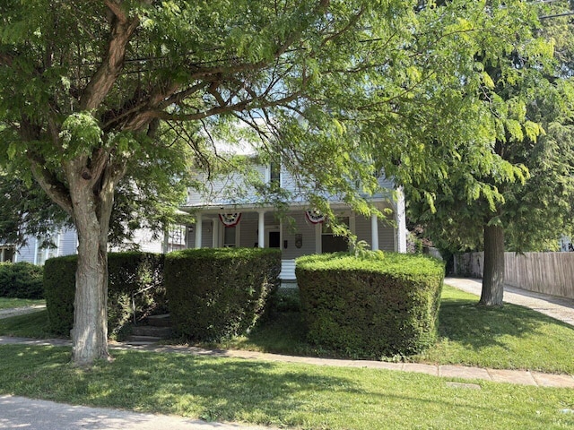 114 E N St, Mount Gilead, OH 43338 - view of property hidden behind natural elements featuring covered porch