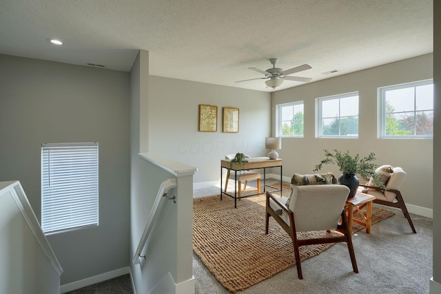 1957 Cumberland St, Newark, OH 43055 - sitting room with an upstairs landing, a ceiling fan, carpet, a textured ceiling, and recessed lighting