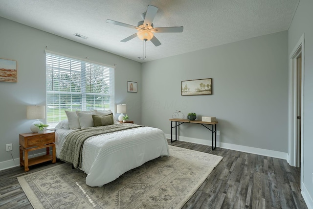 1957 Cumberland St, Newark, OH 43055 - bedroom with wood finished floors, a textured ceiling, and ceiling fan