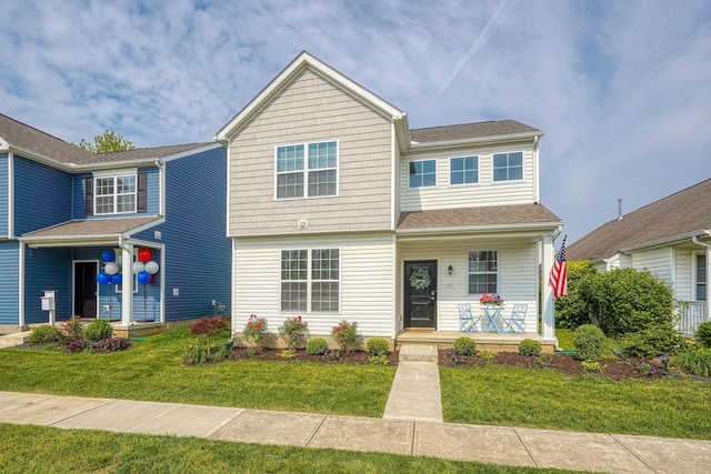 1957 Cumberland St, Newark, OH 43055 - view of front of house with covered porch and a front lawn