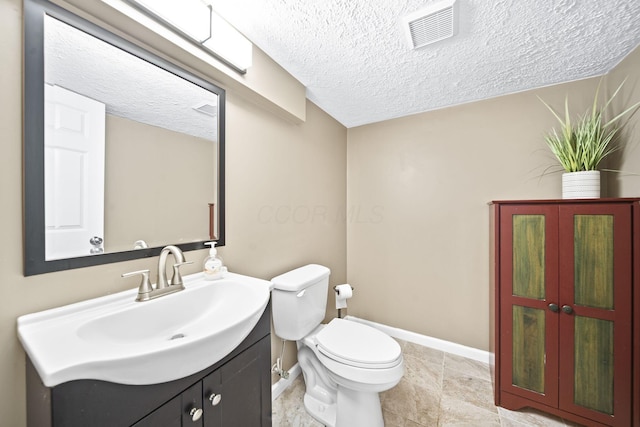 7603 Charlesway Dr Unit 87, Columbus, OH 43085 - half bathroom with vanity and a textured ceiling
