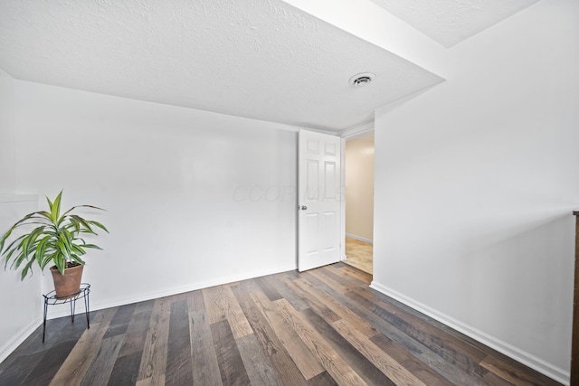7603 Charlesway Dr Unit 87, Columbus, OH 43085 - unfurnished room with wood finished floors and a textured ceiling