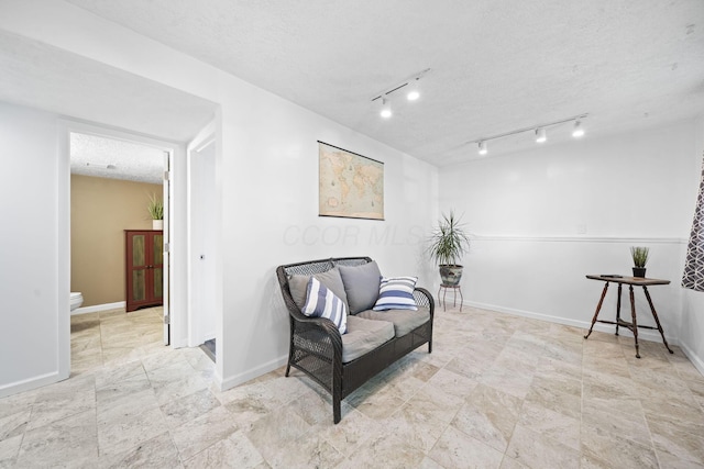 7603 Charlesway Dr Unit 87, Columbus, OH 43085 - living area featuring baseboards