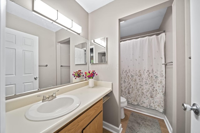 7603 Charlesway Dr Unit 87, Columbus, OH 43085 - bathroom featuring wood finished floors, vanity, and curtained shower