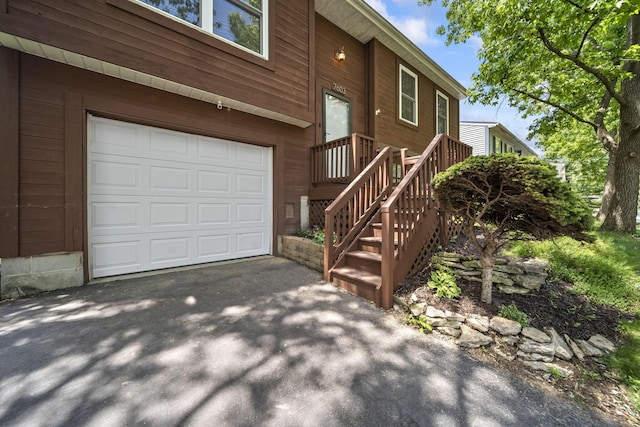 7603 Charlesway Dr Unit 87, Columbus, OH 43085 - garage with asphalt driveway