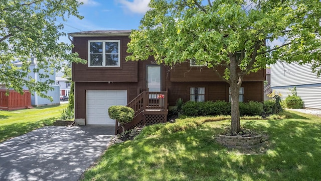 7603 Charlesway Dr Unit 87, Columbus, OH 43085 - raised ranch featuring concrete driveway, a front lawn, and a garage