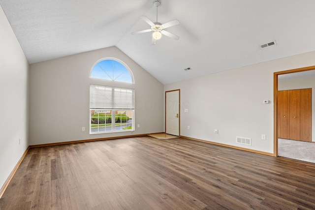 6858 Winrock Dr, New Albany, OH 43054 - spare room with wood finished floors, ceiling fan, and lofted ceiling