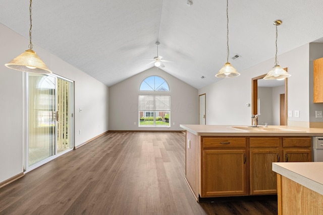 6858 Winrock Dr, New Albany, OH 43054 - kitchen with ceiling fan, lofted ceiling, light countertops, wood finished floors, and open floor plan