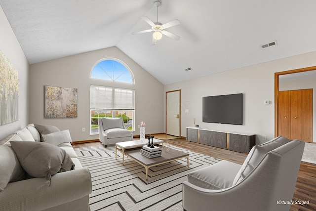 6858 Winrock Dr, New Albany, OH 43054 - living room with wood finished floors, ceiling fan, and lofted ceiling