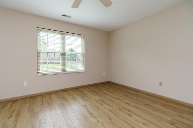 9427 Clermont Cir, Powell, OH 43065 - spare room featuring light wood-style flooring and ceiling fan
