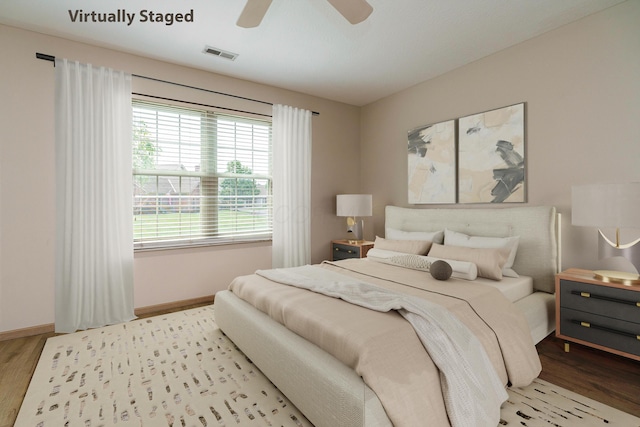9427 Clermont Cir, Powell, OH 43065 - bedroom with wood finished floors and a ceiling fan