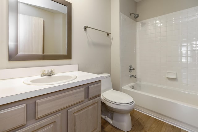 9427 Clermont Cir, Powell, OH 43065 - bathroom with vanity, wood finished floors, and shower / washtub combination