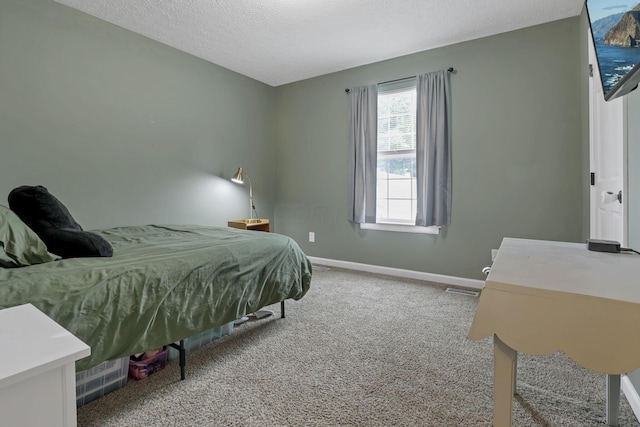 5010 Nelson Dr, South Bloomfield, OH 43103 - carpeted bedroom featuring a textured ceiling and baseboards