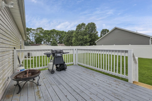 5010 Nelson Dr, South Bloomfield, OH 43103 - wooden deck featuring a grill