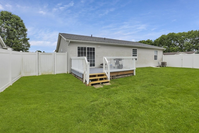 5010 Nelson Dr, South Bloomfield, OH 43103 - rear view of house with a wooden deck and central AC