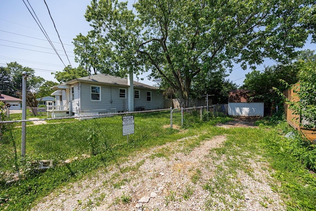 1900 S Champion Ave, Columbus, OH 43207 - fenced yard with dirt driveway and an outbuilding