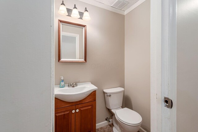 8800 Greenburg Dr, Powell, OH 43065 - bathroom featuring vanity, crown molding, toilet, and baseboards