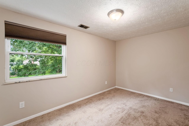 8800 Greenburg Dr, Powell, OH 43065 - empty room with carpet, baseboards, and a textured ceiling