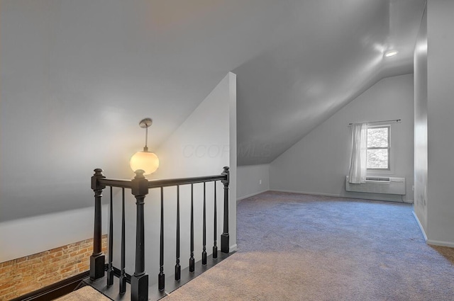 193 E Mithoff St Unit 193, Columbus, OH 43206 - bonus room with vaulted ceiling, carpet flooring, and a wall mounted AC