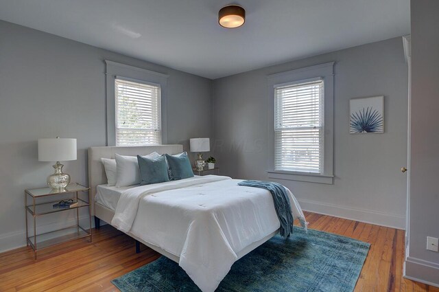 193 E Mithoff St Unit 193, Columbus, OH 43206 - bedroom with light wood finished floors and baseboards