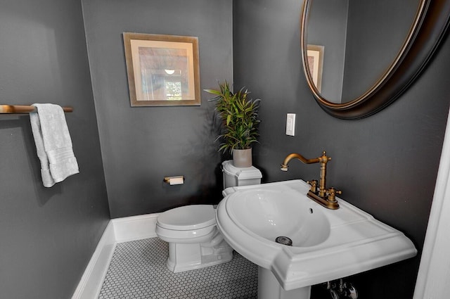 193 E Mithoff St Unit 193, Columbus, OH 43206 - half bath with toilet and tile patterned floors