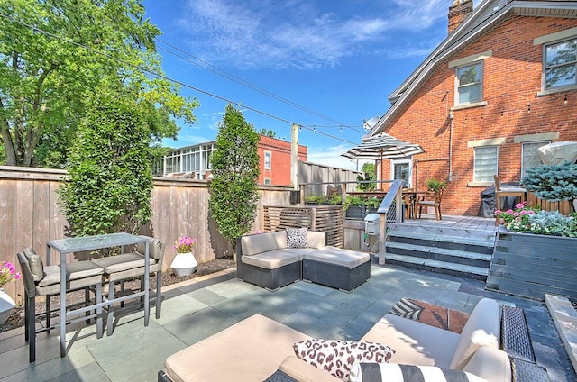 193 E Mithoff St Unit 193, Columbus, OH 43206 - view of patio / terrace with an outdoor hangout area, a wooden deck, and outdoor dining space