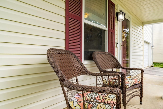 7524 Hemrich Dr, Canal Winchester, OH 43110 - covered porch with a garage and concrete driveway