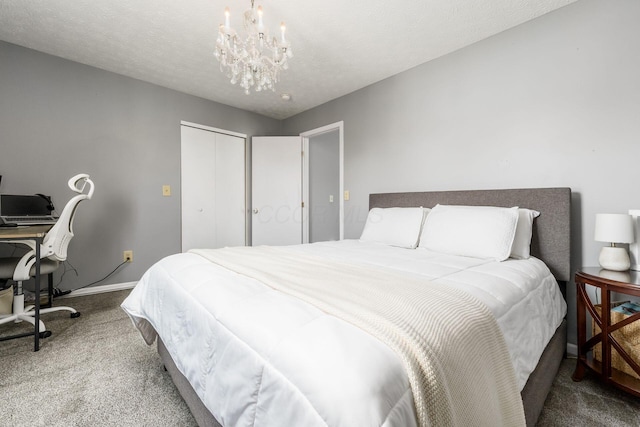 7524 Hemrich Dr, Canal Winchester, OH 43110 - carpeted bedroom featuring a chandelier, an office area, and a closet