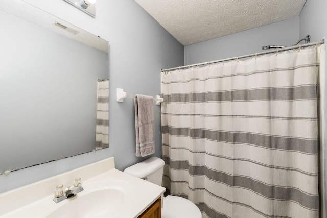 7524 Hemrich Dr, Canal Winchester, OH 43110 - bathroom with vanity, a textured ceiling, and a shower with shower curtain