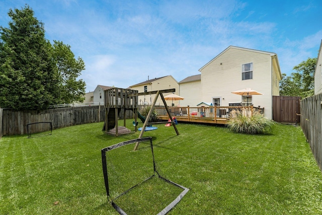 7524 Hemrich Dr, Canal Winchester, OH 43110 - fenced backyard with a playground and a wooden deck
