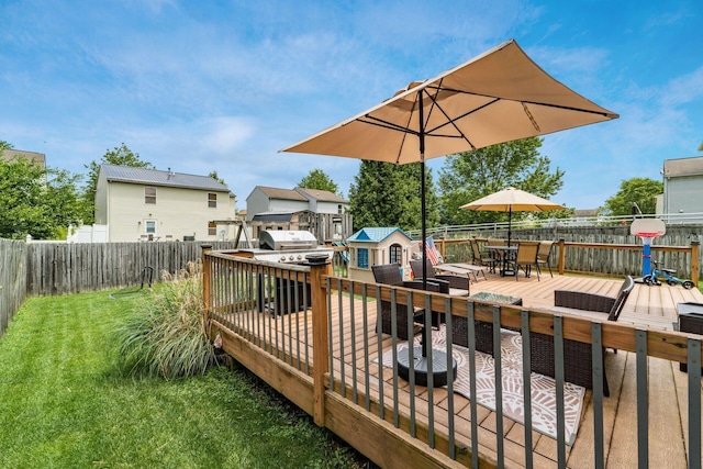 7524 Hemrich Dr, Canal Winchester, OH 43110 - wooden terrace with outdoor dining space, a fenced backyard, and a shed
