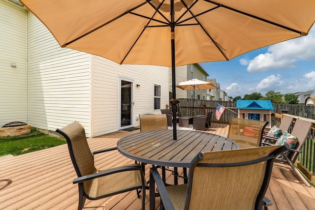 7524 Hemrich Dr, Canal Winchester, OH 43110 - wooden deck featuring outdoor dining area and a storage unit