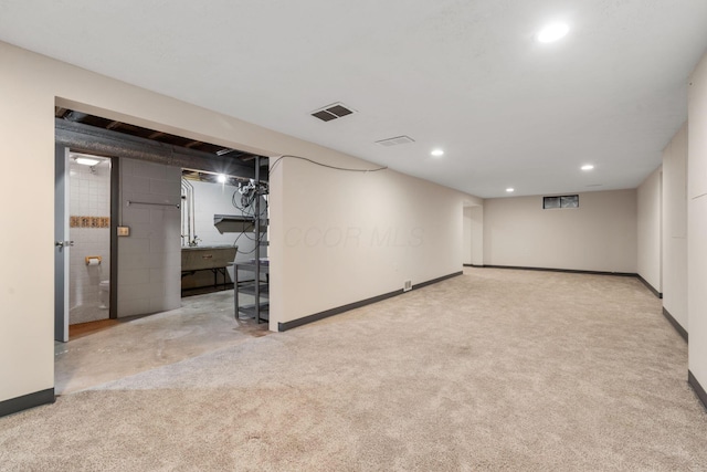992 S Hague Ave, Columbus, OH 43204 - finished below grade area with carpet flooring, recessed lighting, and baseboards