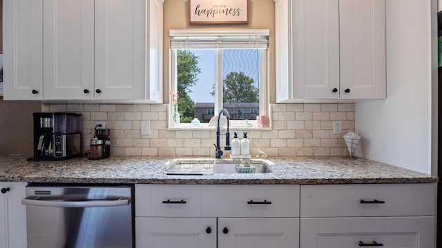 5225 Springdale Blvd, Hilliard, OH 43026 - kitchen with dishwasher, white cabinets, and backsplash