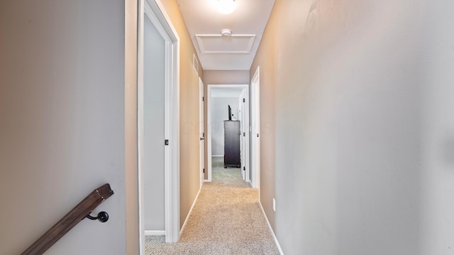 5225 Springdale Blvd, Hilliard, OH 43026 - hallway featuring light colored carpet, attic access, and an upstairs landing