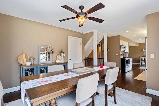 5225 Springdale Blvd, Hilliard, OH 43026 - dining room featuring ceiling fan, dark wood-type flooring, recessed lighting, and stairs