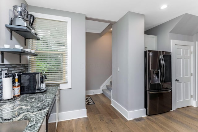 1167 Neil Ave, Columbus, OH 43201 - kitchen featuring stainless steel fridge, open shelves, baseboards, wood finished floors, and backsplash