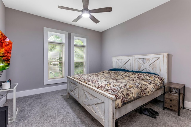 1167 Neil Ave, Columbus, OH 43201 - carpeted bedroom featuring baseboards and a ceiling fan