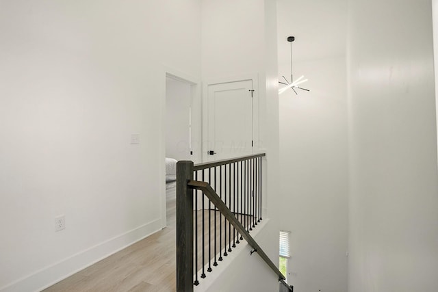 92 E Innis Ave, Columbus, OH 43207 - staircase featuring wood finished floors and a high ceiling
