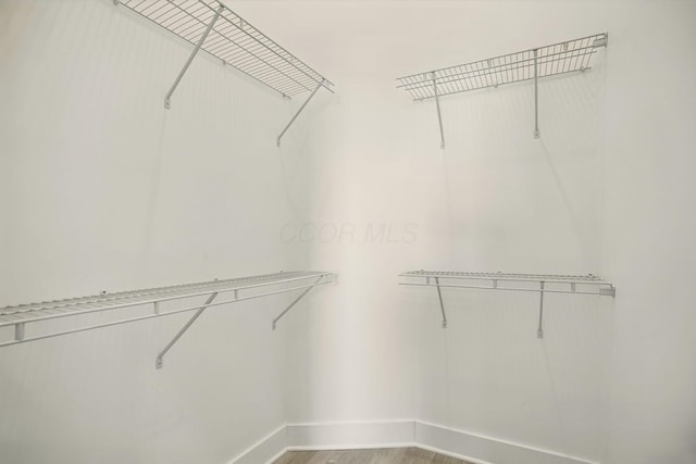 92 E Innis Ave, Columbus, OH 43207 - walk in closet featuring light wood finished floors