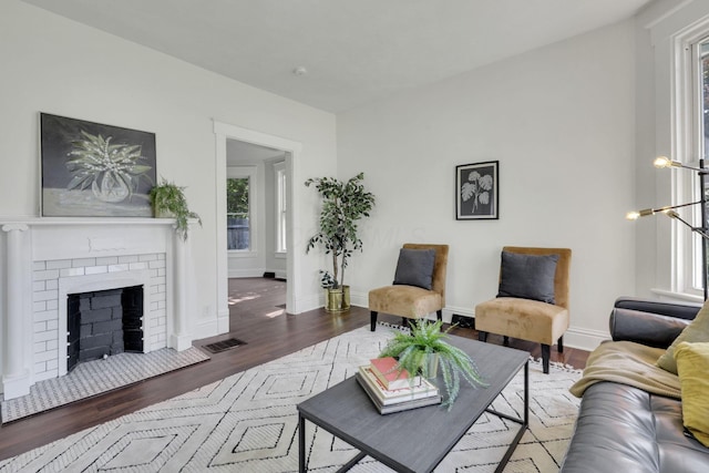 638 E 6th Ave, Lancaster, OH 43130 - living area featuring wood finished floors and a fireplace