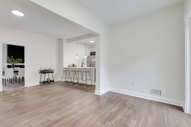 638 E 6th Ave, Lancaster, OH 43130 - unfurnished room featuring wood finished floors and recessed lighting