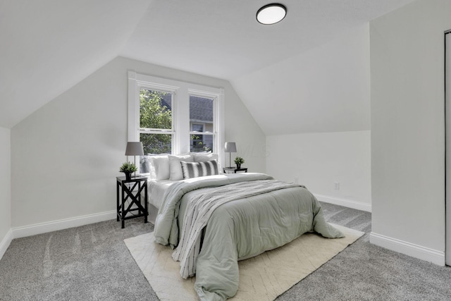 638 E 6th Ave, Lancaster, OH 43130 - bedroom featuring light colored carpet and vaulted ceiling