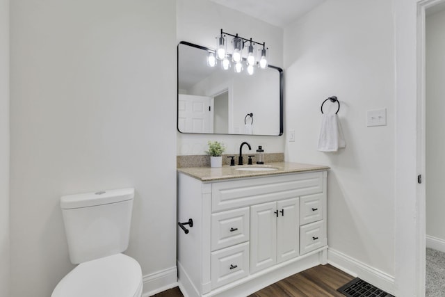 638 E 6th Ave, Lancaster, OH 43130 - bathroom featuring vanity and wood finished floors