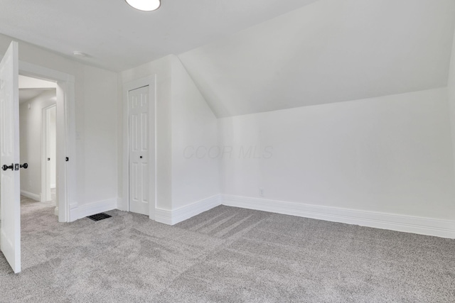 638 E 6th Ave, Lancaster, OH 43130 - bonus room featuring carpet floors and vaulted ceiling