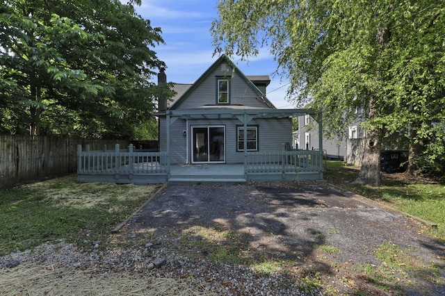 638 E 6th Ave, Lancaster, OH 43130 - view of front of property with a wooden deck and a chimney