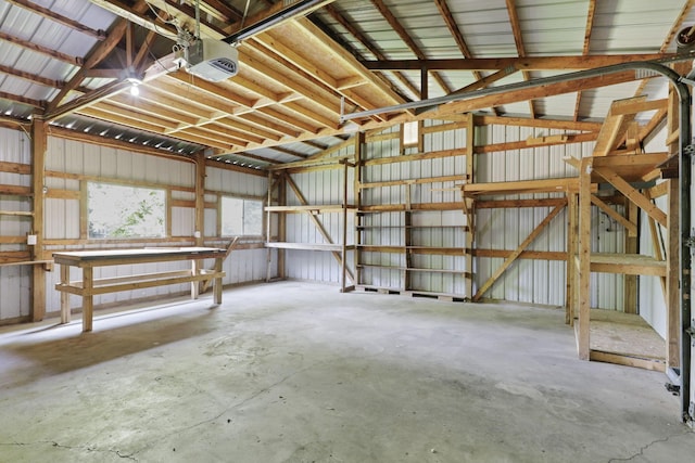 638 E 6th Ave, Lancaster, OH 43130 - garage with a garage door opener and metal wall