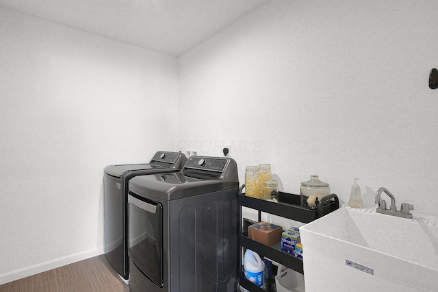 120 Heron Ave, Pataskala, OH 43062 - laundry room with independent washer and dryer and wood finished floors