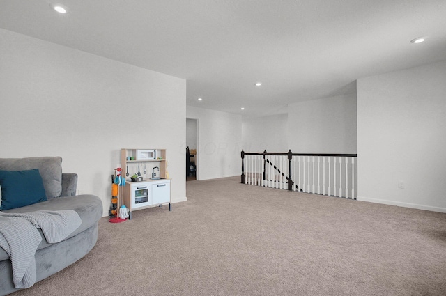 120 Heron Ave, Pataskala, OH 43062 - living area featuring carpet flooring, recessed lighting, and an upstairs landing